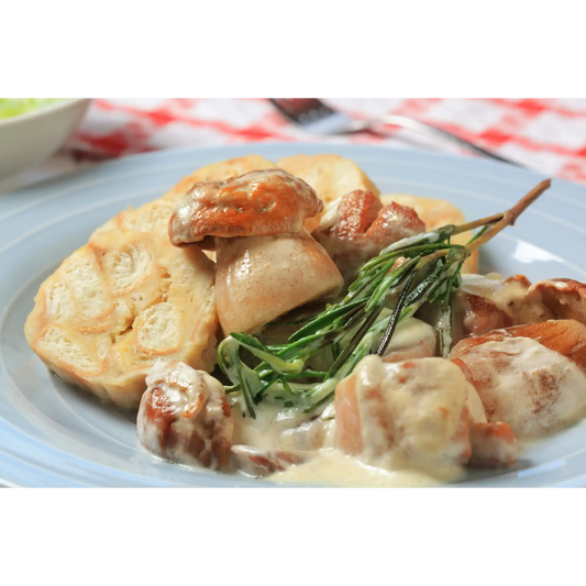 Knodel di pane con funghi porcini e salsa alla Weizen